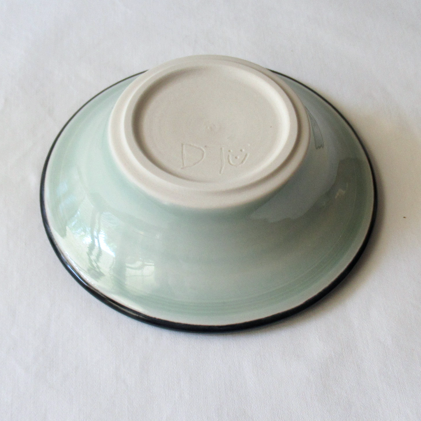 A Celadon Glazed Flared Rimmed Bowl