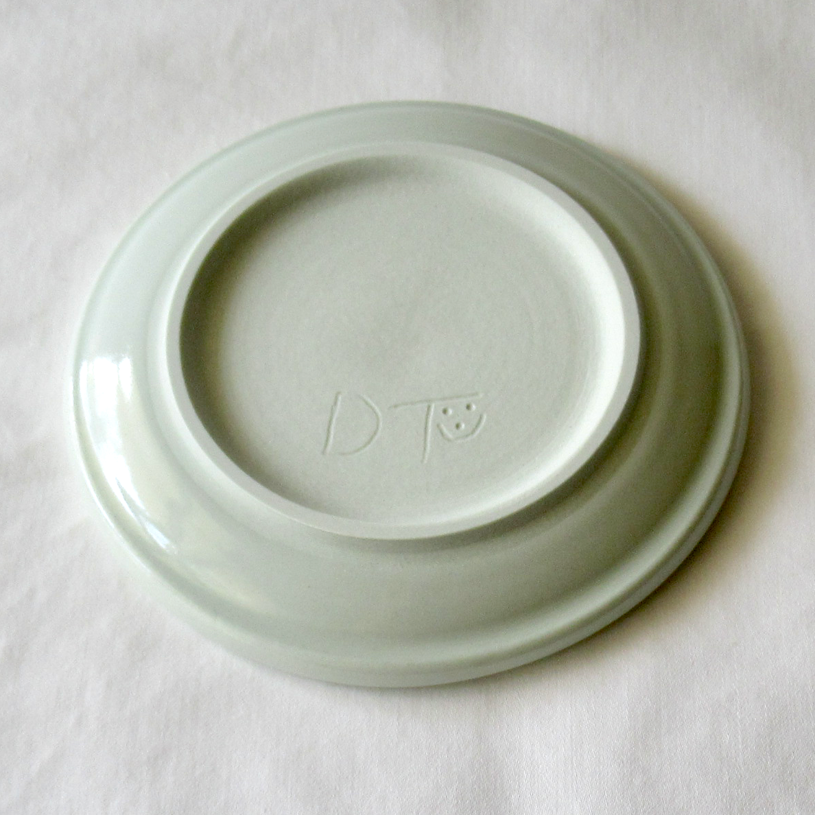 A Hand-drawn Wheel-thrown Sand Dollar and Polka Dot Sgraffito Plate