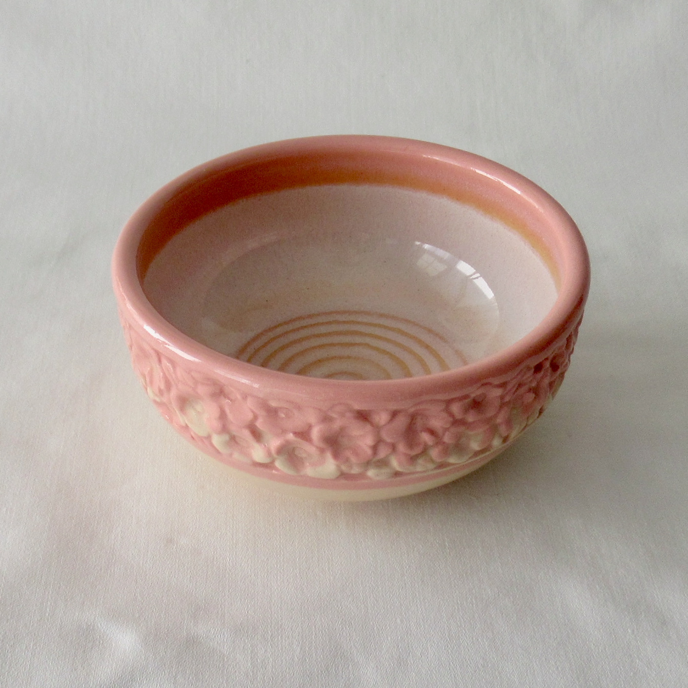Hand-Carved Flowers on a Small Pink Neriage Wheel-thrown Bowl