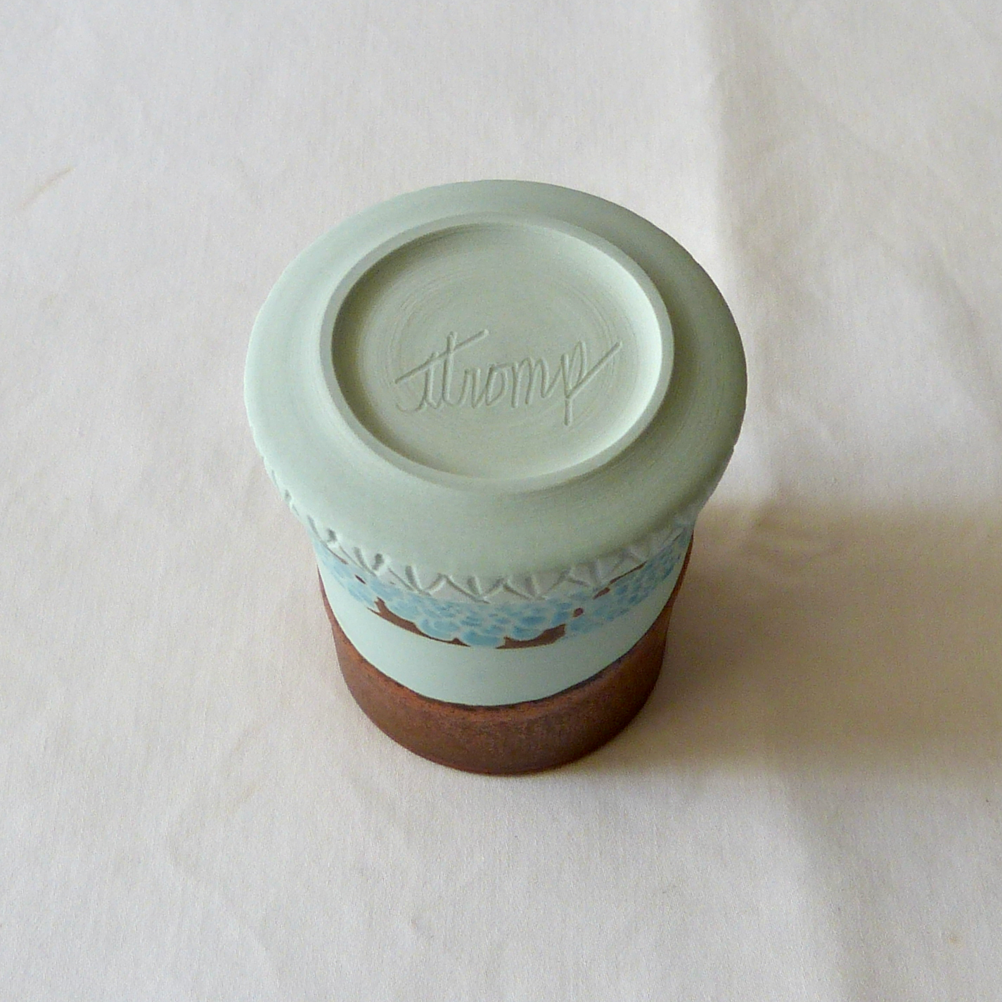 A Blue Turquoise Dahlia Bud Vase with Copper Float Rim