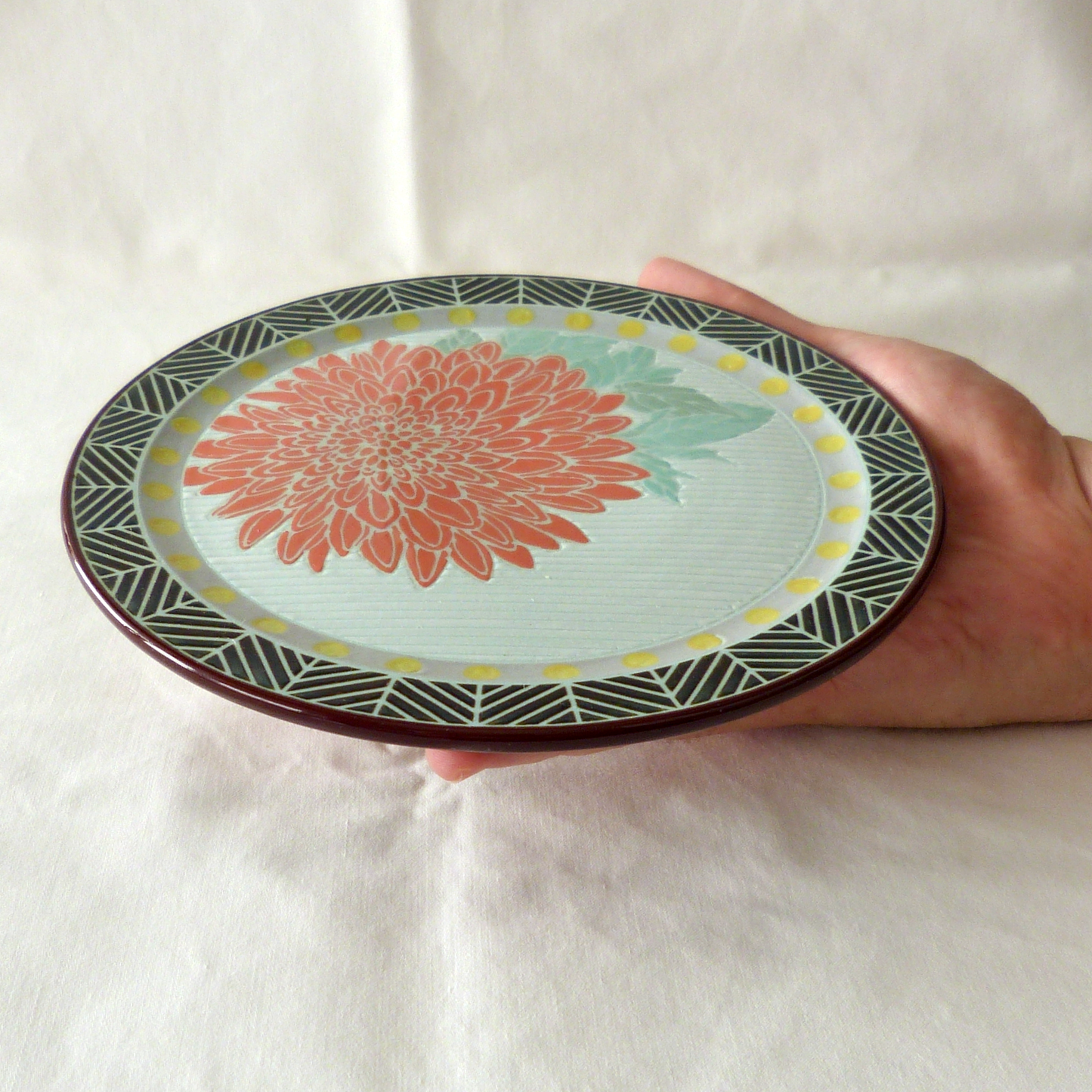A Hand Drawn and Glazed Porcelain Dahlia Bowl and Matching Plate