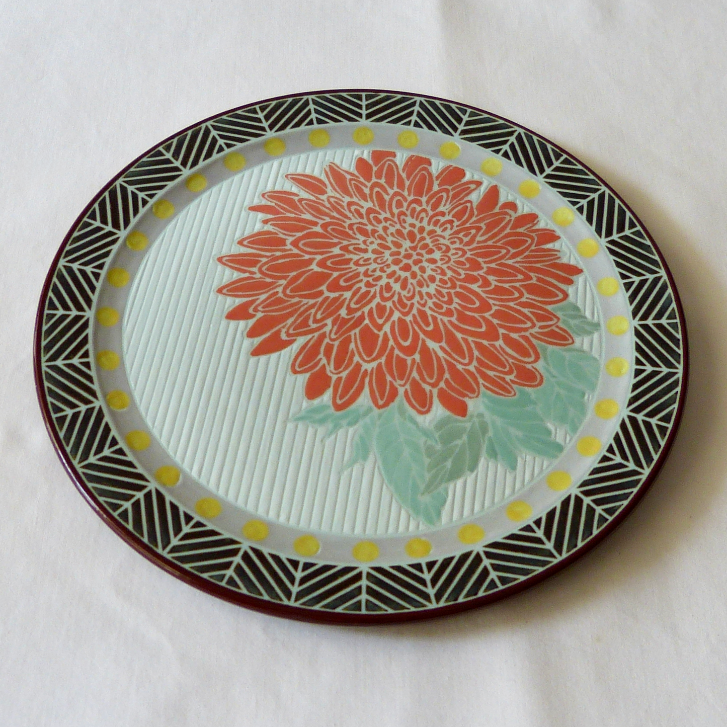 A Hand Drawn and Glazed Porcelain Dahlia Bowl and Matching Plate
