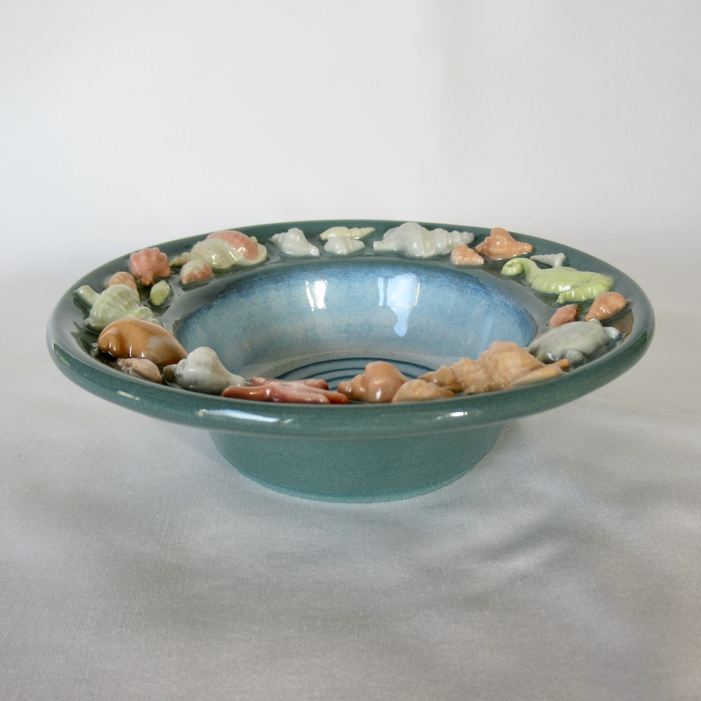 Handmade Dark Teal Colored Porcelain Seashell Trinket Bowl. Ceramic Pottery.