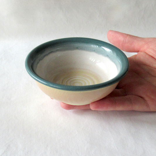 A Small Hand Crafted Dark Green and Pink Chatter Bowl