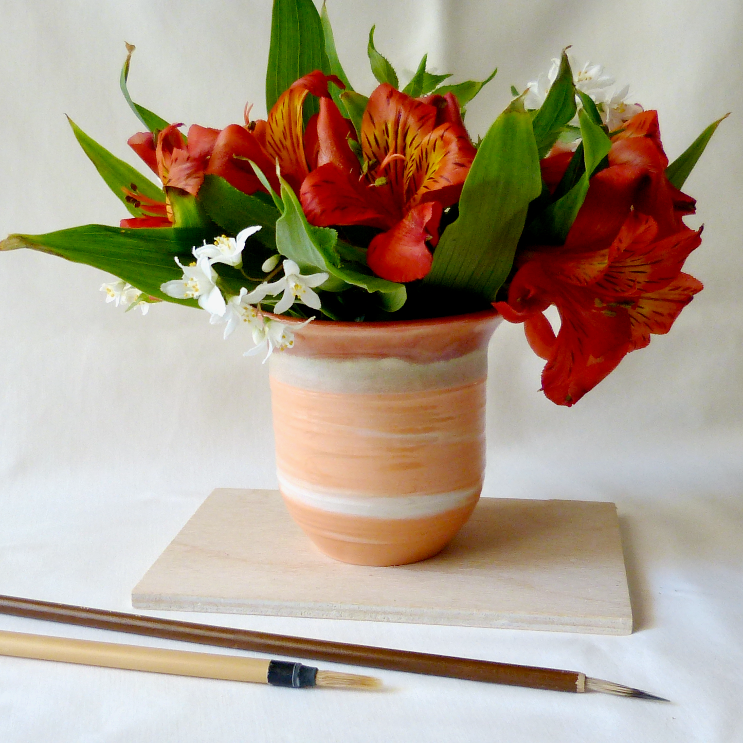Wheel-thrown Orange and White Swirled Colored Porcelain Bud Vase. Neriage Technique. Ceramic Pottery