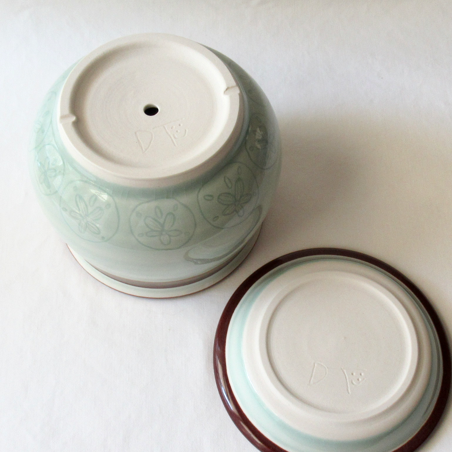 A Wheel-thrown Celadon Planter with Matching Saucer