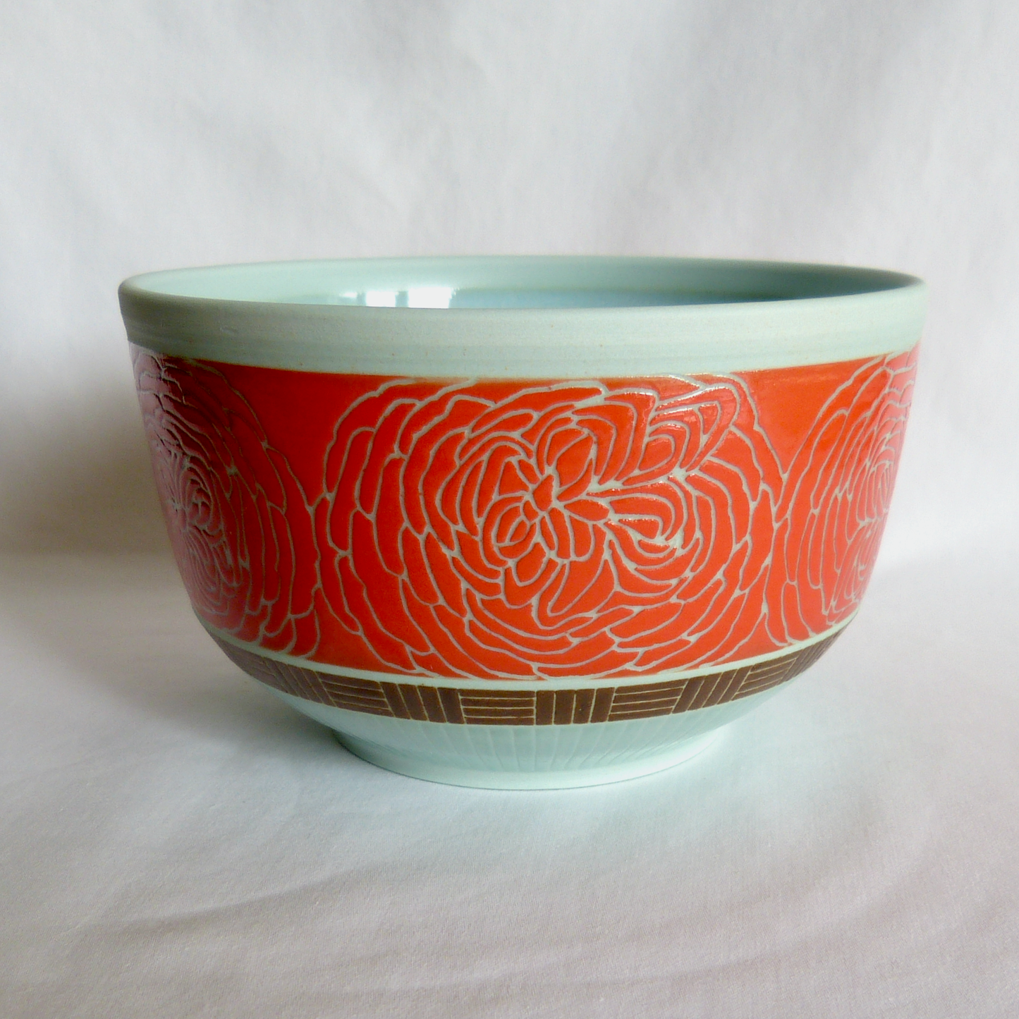A Hand Drawn and Glazed Turquoise Porcelain Quartered Roses Lidded Bowl