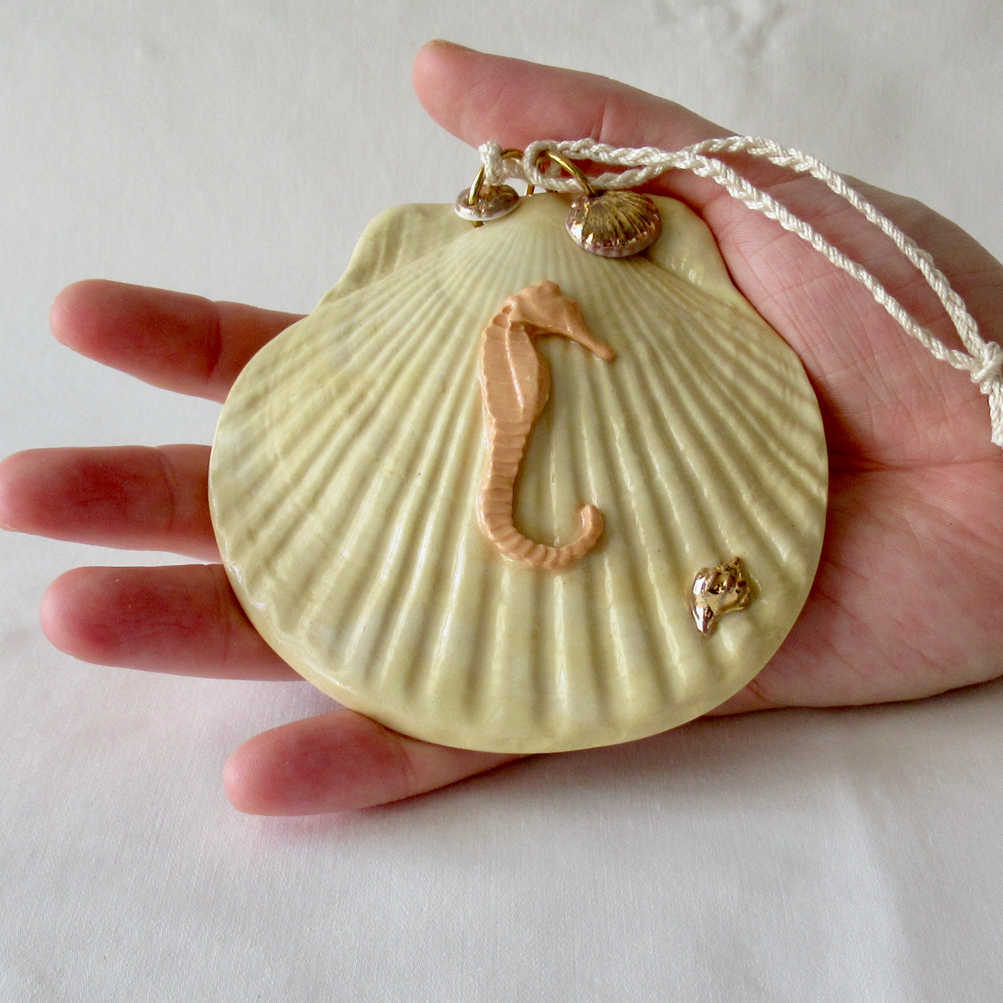 Handmade Seashell Pale Yellow Colored Porcelain Hanging Ornament. Ceramic Pottery.