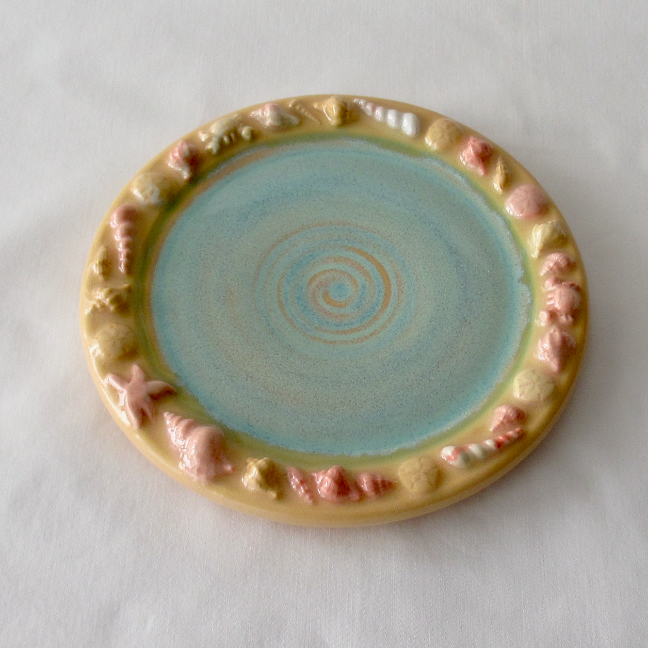 Wheel-thrown Decorative Plate Adorned with Agateware Seashells. Ceramic Pottery