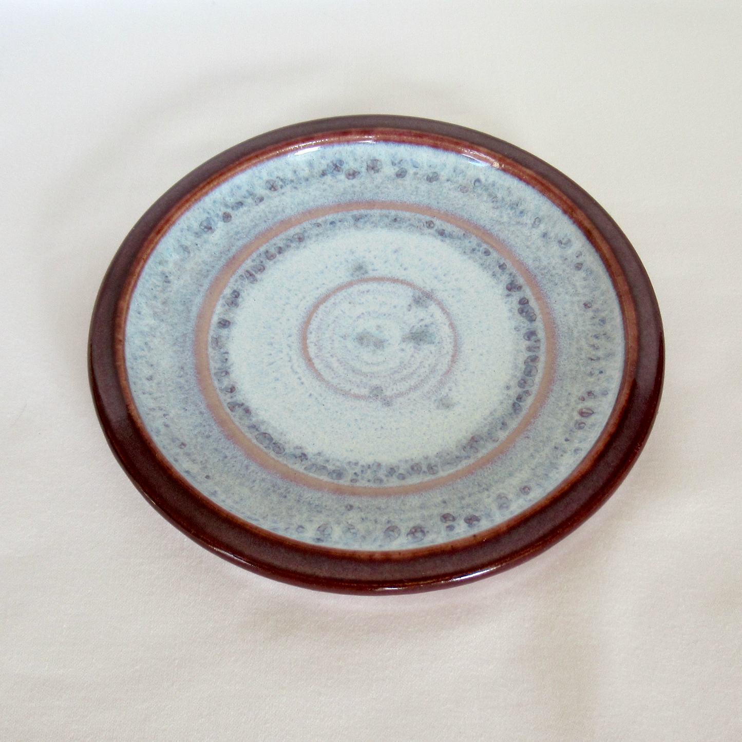 Wheel-thrown Small Handmade Candle Plate. Lilac Colored Ceramic Porcelain Pottery.