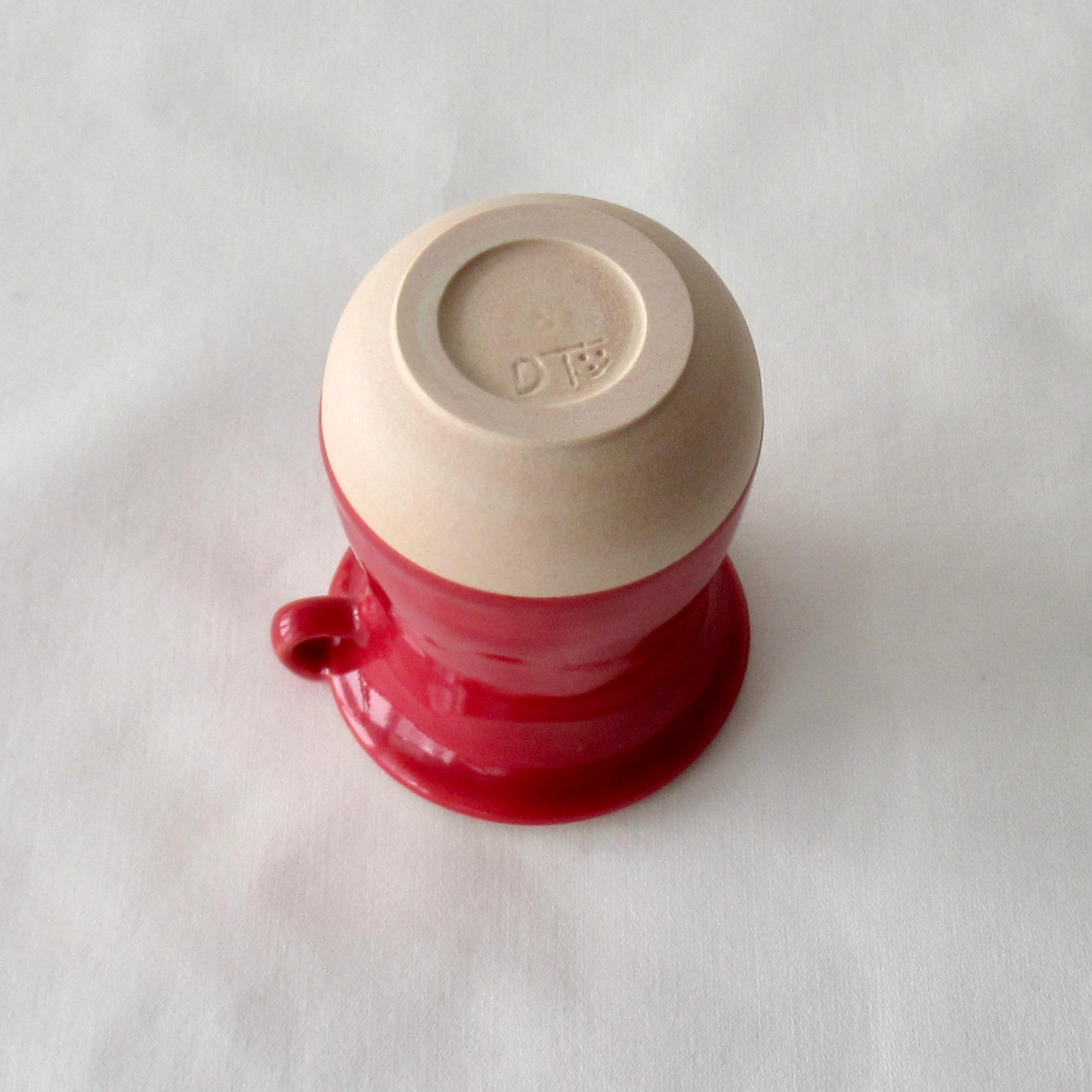 Handmade Seashell Bud Vase. Dark Red Celadon Glaze with Sand Dollar Charms.