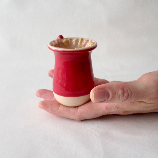 Handmade Seashell Bud Vase. Dark Red Celadon Glaze with Sand Dollar Charms.