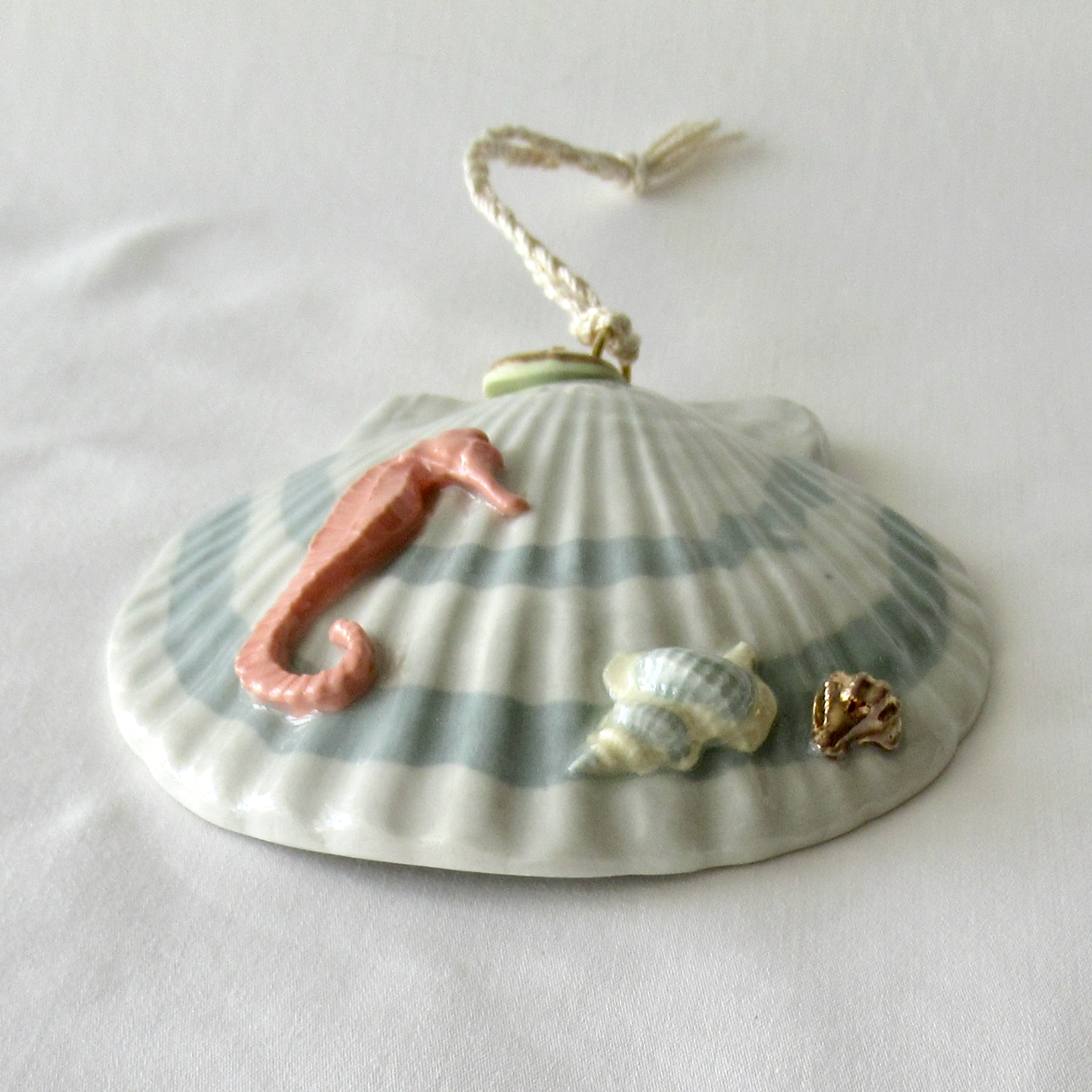 Handmade Seashell Teal Colored Porcelain Hanging Ornament. Ceramic Pottery.