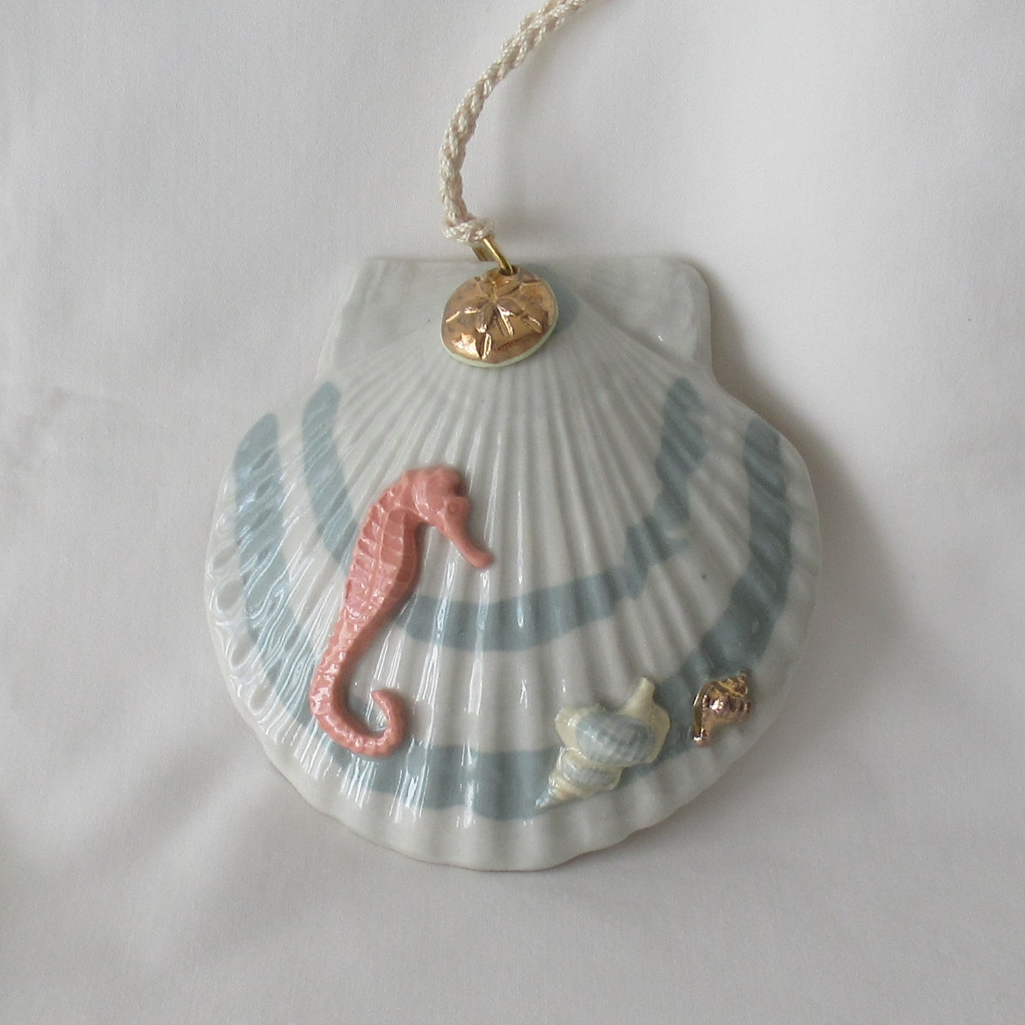Handmade Seashell Teal Colored Porcelain Hanging Ornament. Ceramic Pottery.