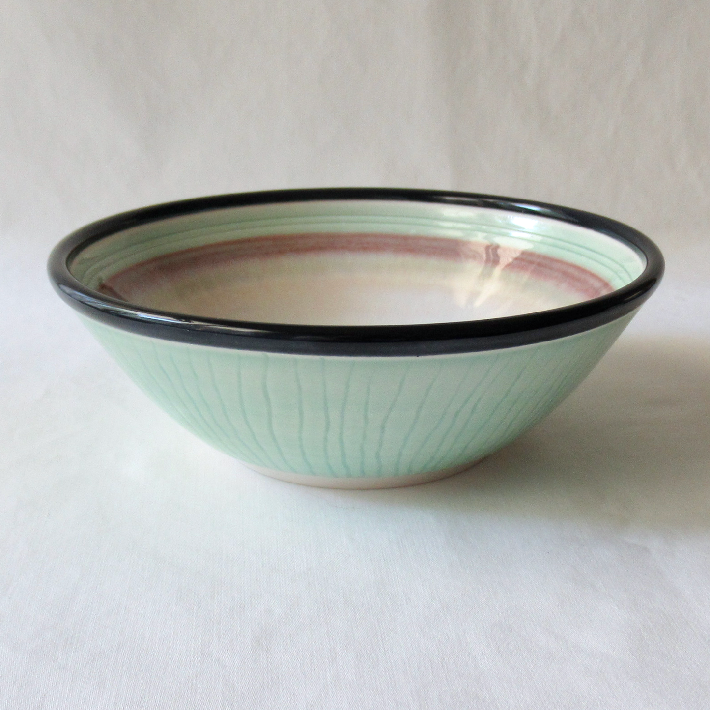 A Light Aqua Green Wheel-thrown Porcelain Bowl
