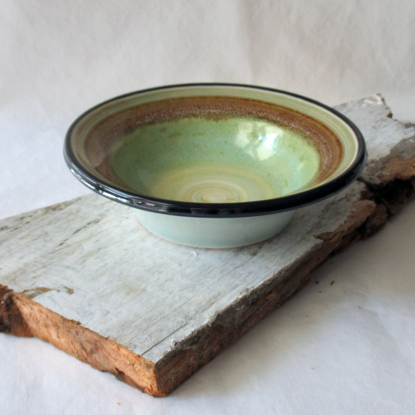 A Celadon Glazed Flared Rimmed Bowl