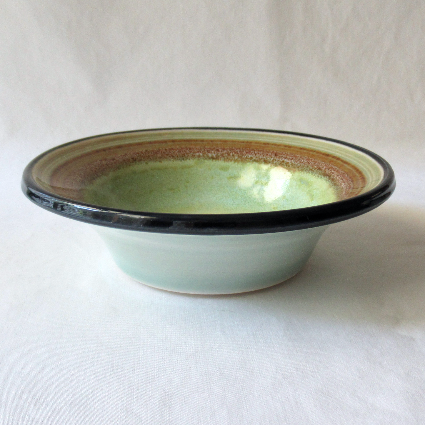 A Celadon Glazed Flared Rimmed Bowl