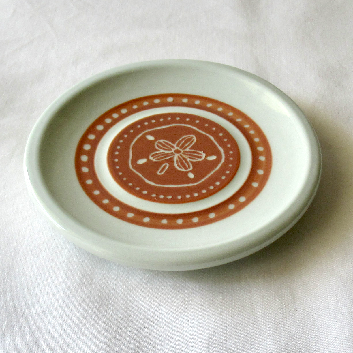 A Hand-drawn Wheel-thrown Sand Dollar and Polka Dot Sgraffito Plate