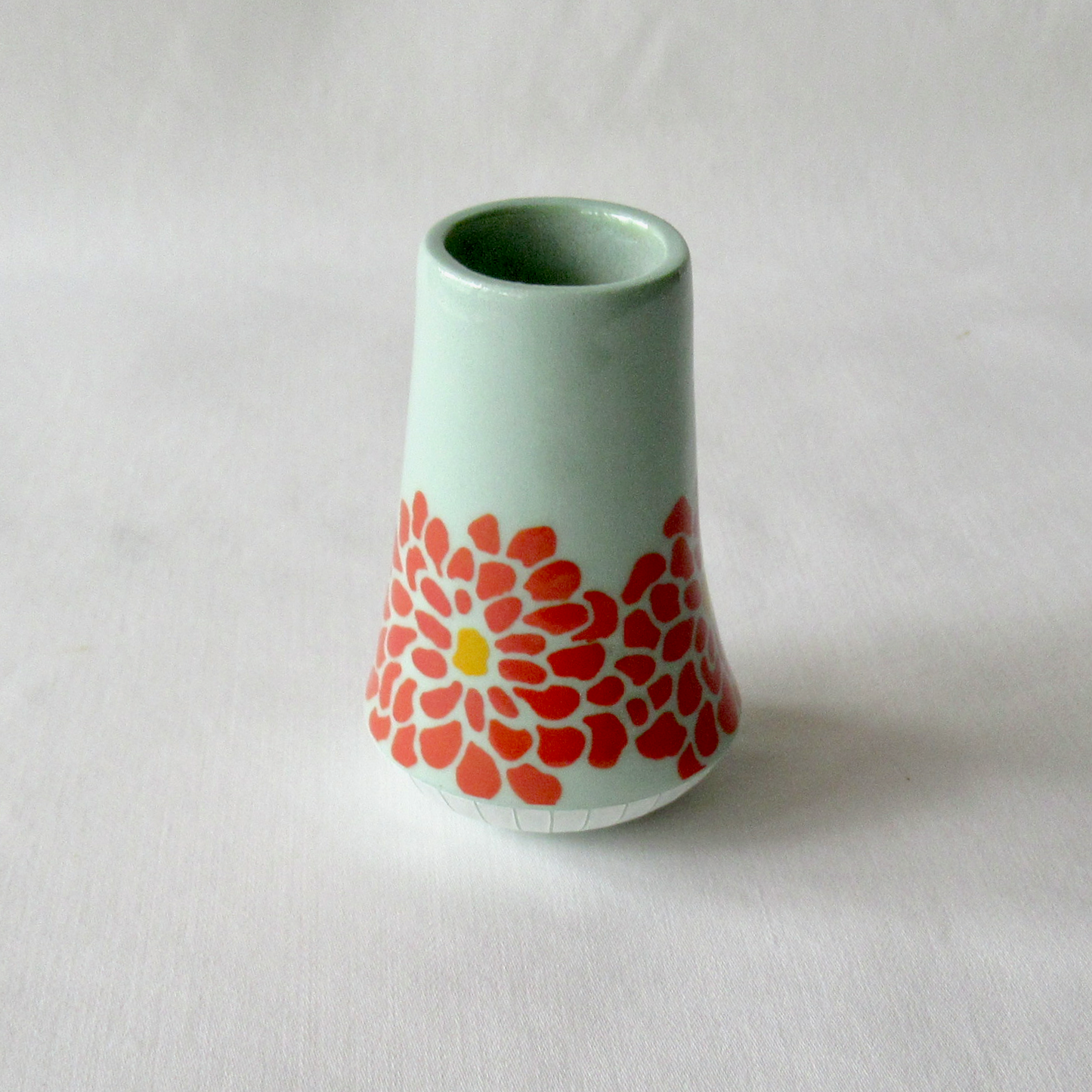 A Very Small Wheel-thrown Porcelain Bud Vase with Hand Glazed Zinnia Design