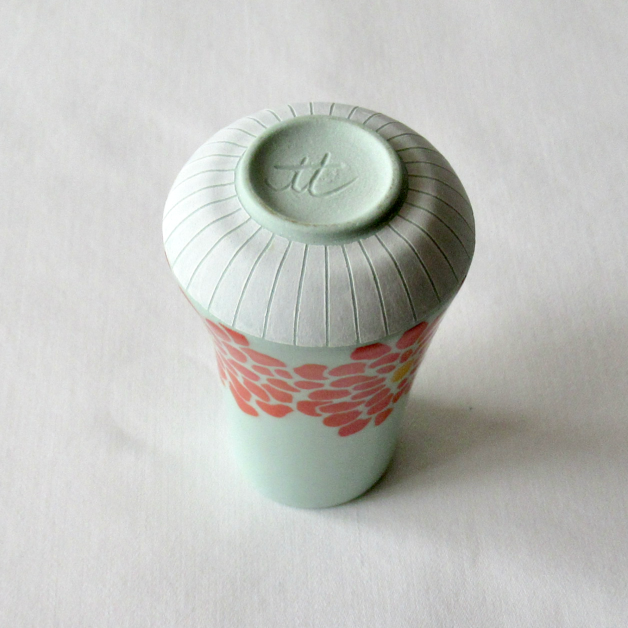 A Very Small Wheel-thrown Porcelain Bud Vase with Hand Glazed Zinnia Design