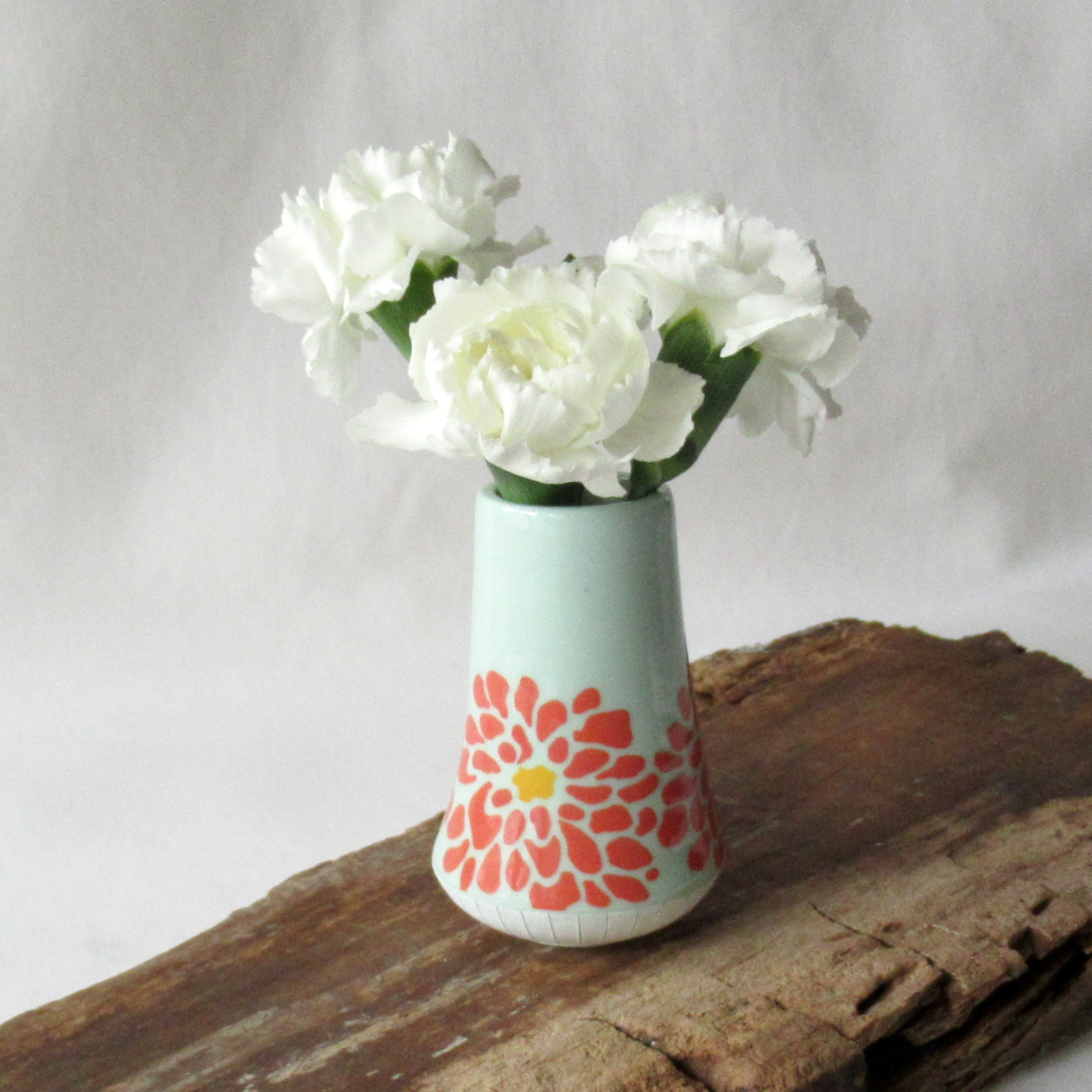 A Very Small Wheel-thrown Porcelain Bud Vase with Hand Glazed Zinnia Design
