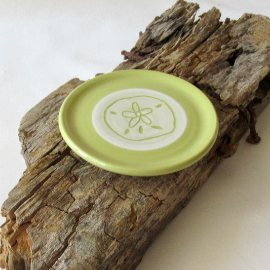 A Very Small Wheel-thrown Lime Green Porcelain Sand Dollar Sgraffito Plate