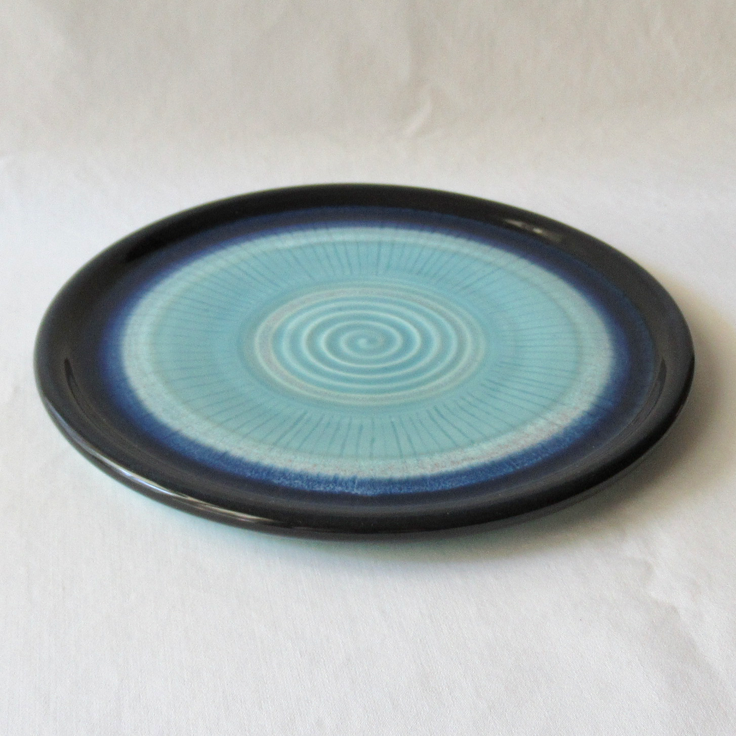 A Wheel-thrown Blue Swirled Appetizer Plate