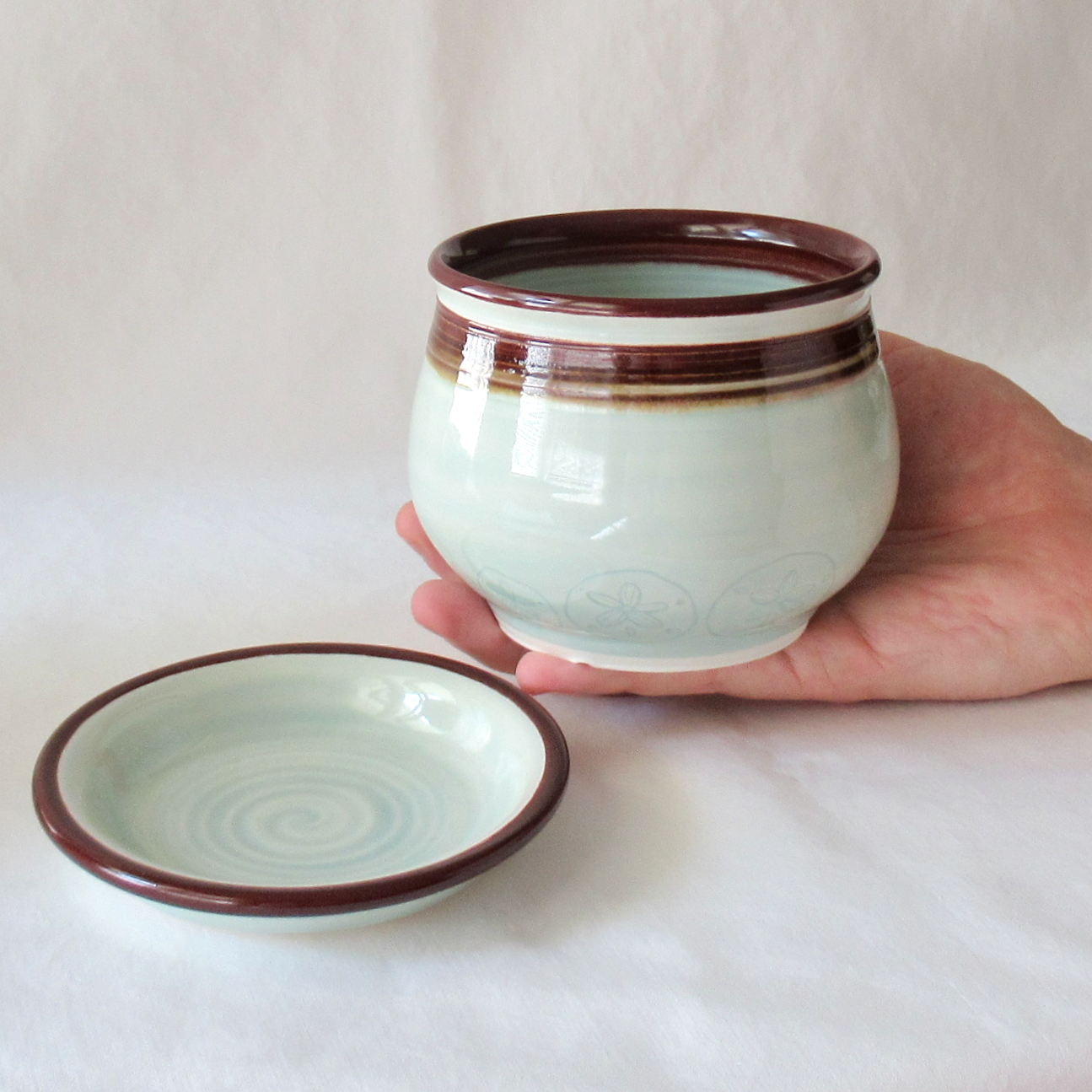 A Wheel-thrown Celadon Planter with Matching Saucer