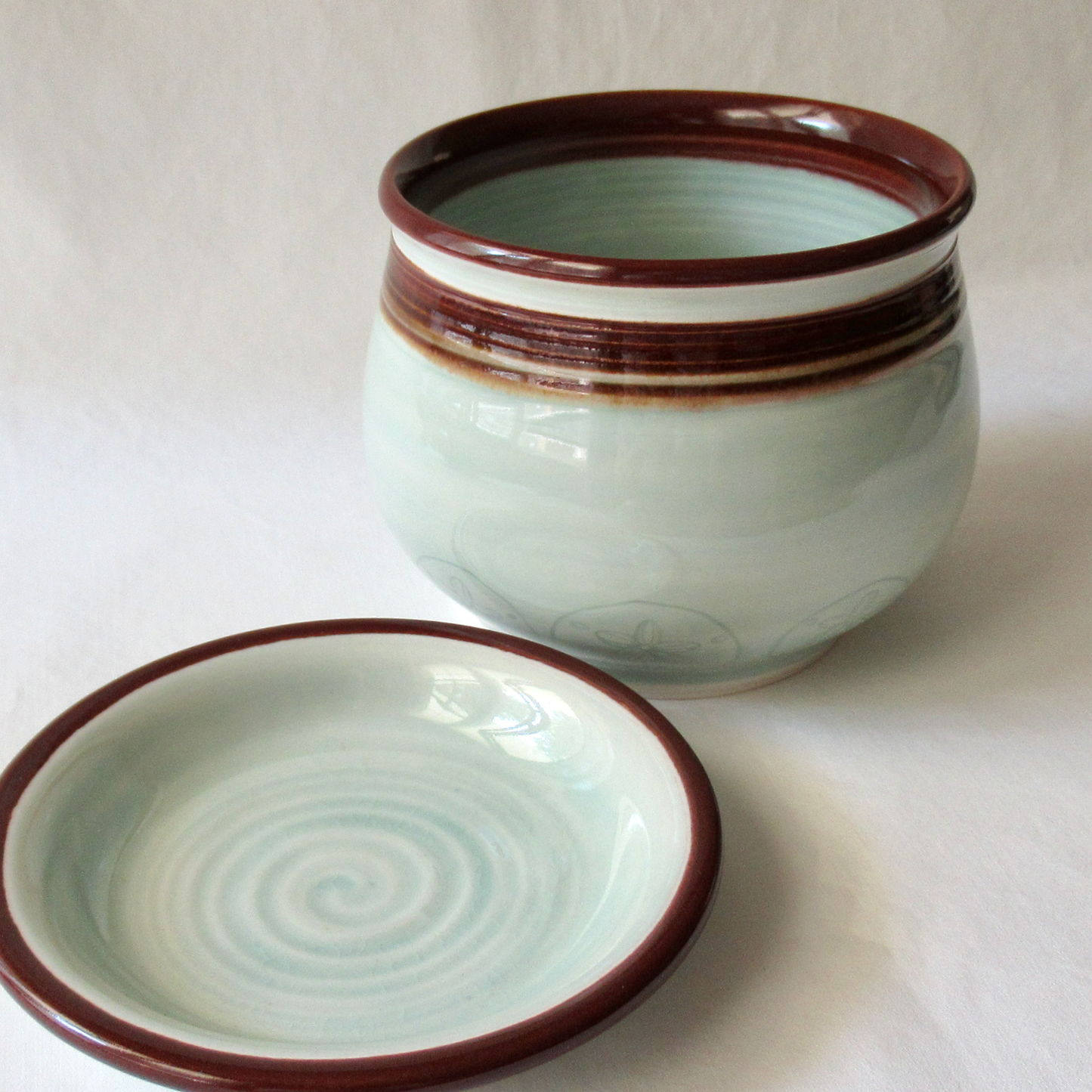 A Wheel-thrown Celadon Planter with Matching Saucer