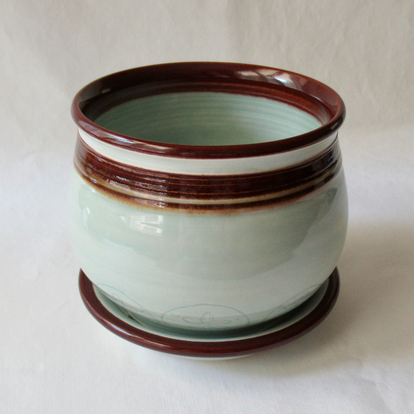 A Wheel-thrown Celadon Planter with Matching Saucer