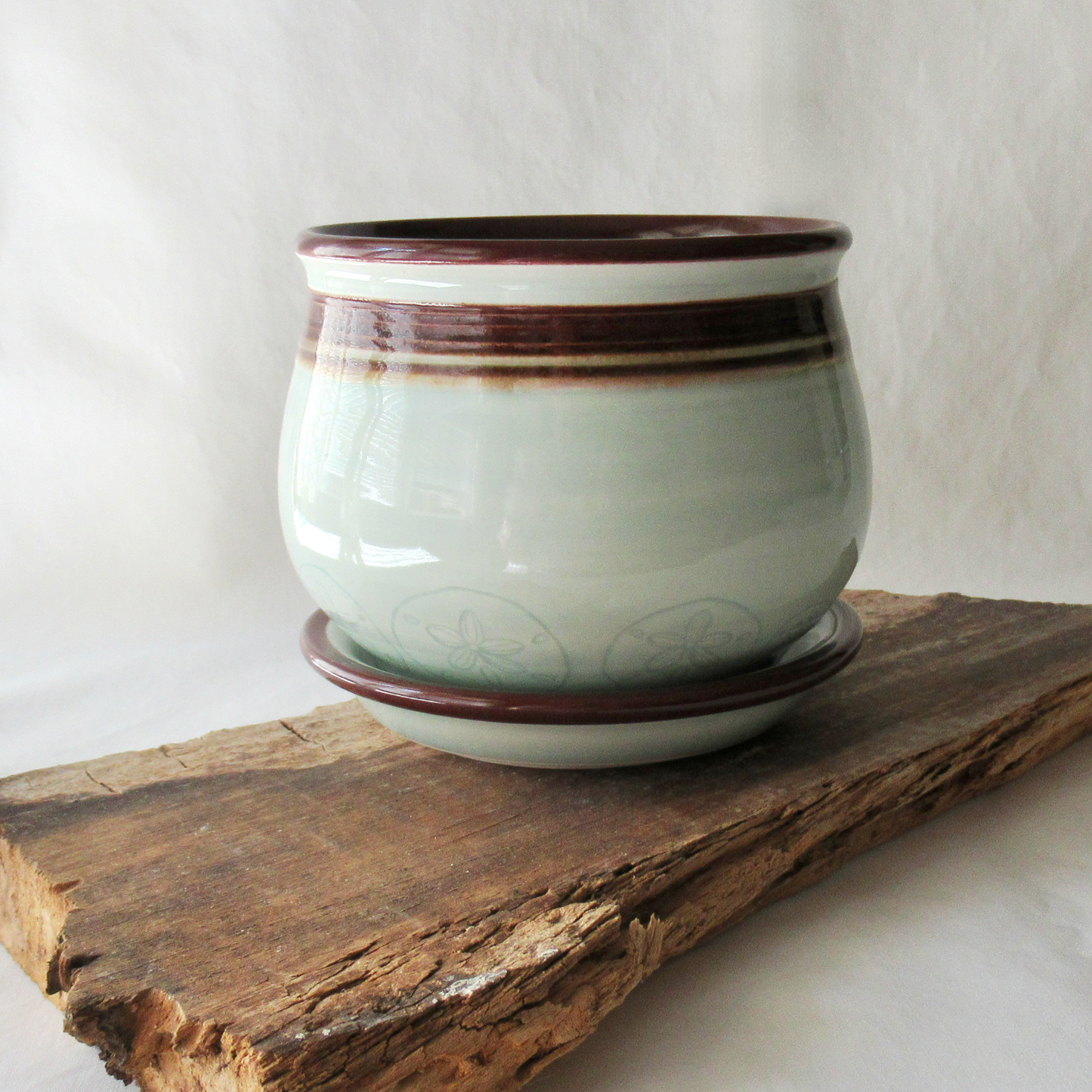 A Wheel-thrown Celadon Planter with Matching Saucer