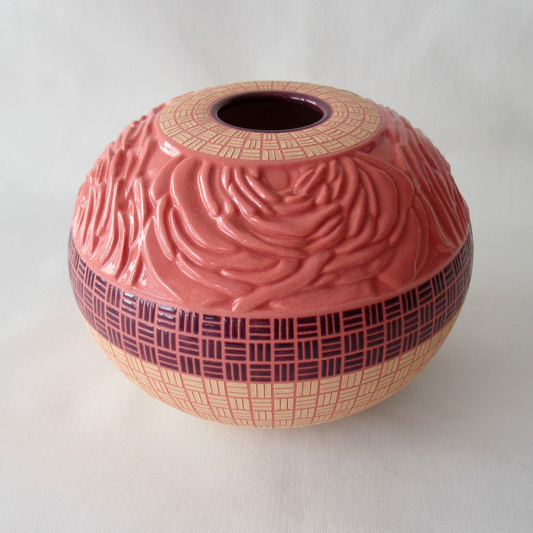 A Hand Carved Ranunculus Bowl with Checkered Design. Wheel-thrown Ceramic Pottery.