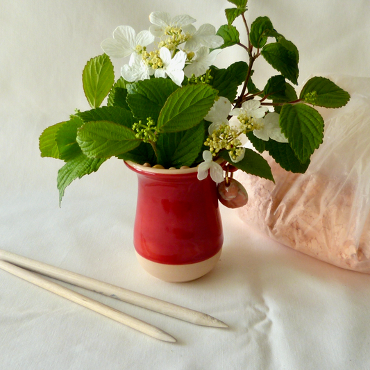 Handmade Seashell Bud Vase. Dark Red Celadon Glaze with Sand Dollar Charms.