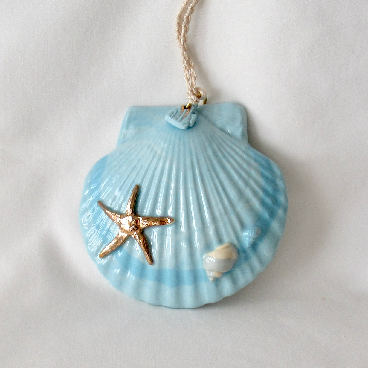 Handmade Seashell Blue Colored Porcelain Hanging Ornament. Ceramic Pottery