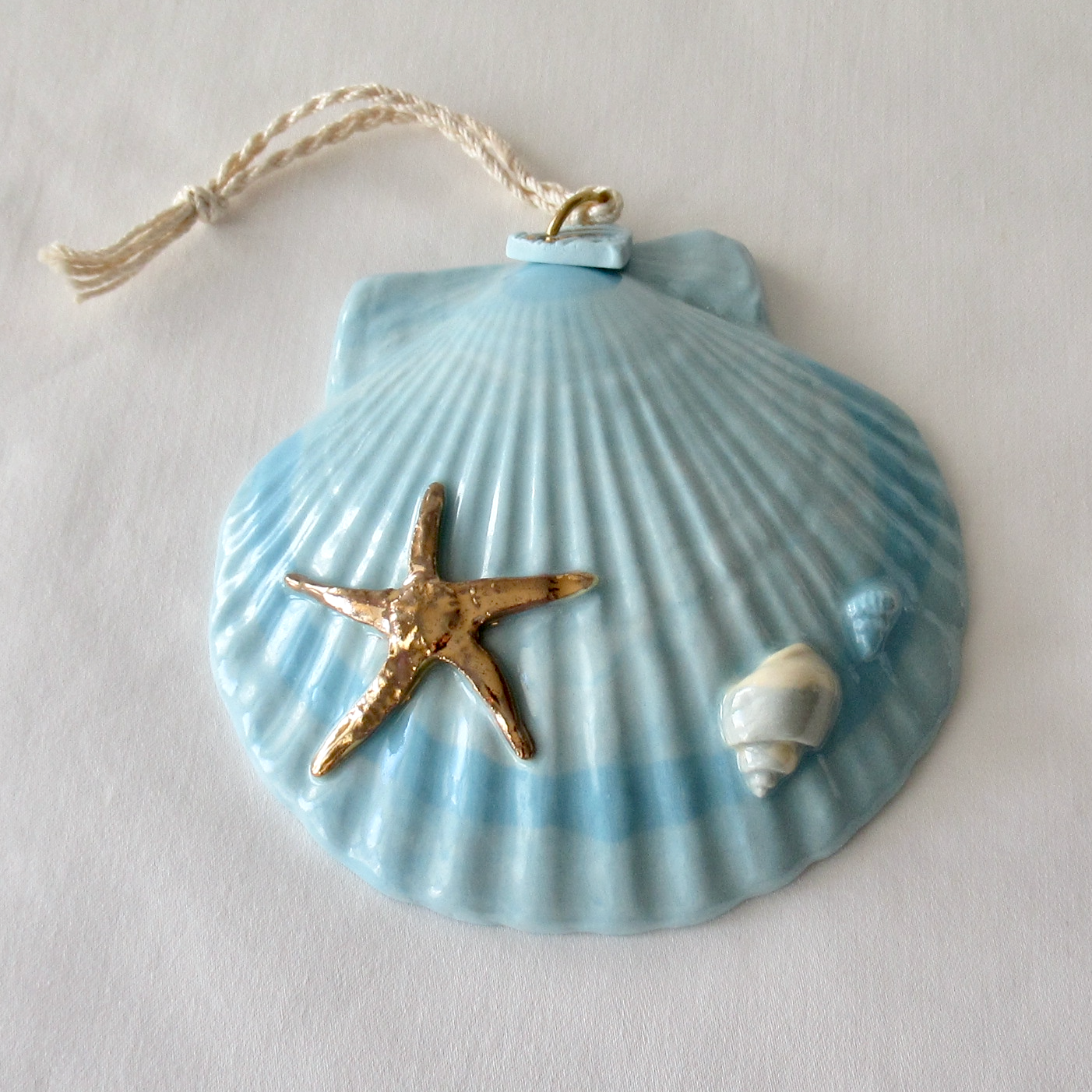 Handmade Seashell Blue Colored Porcelain Hanging Ornament. Ceramic Pottery