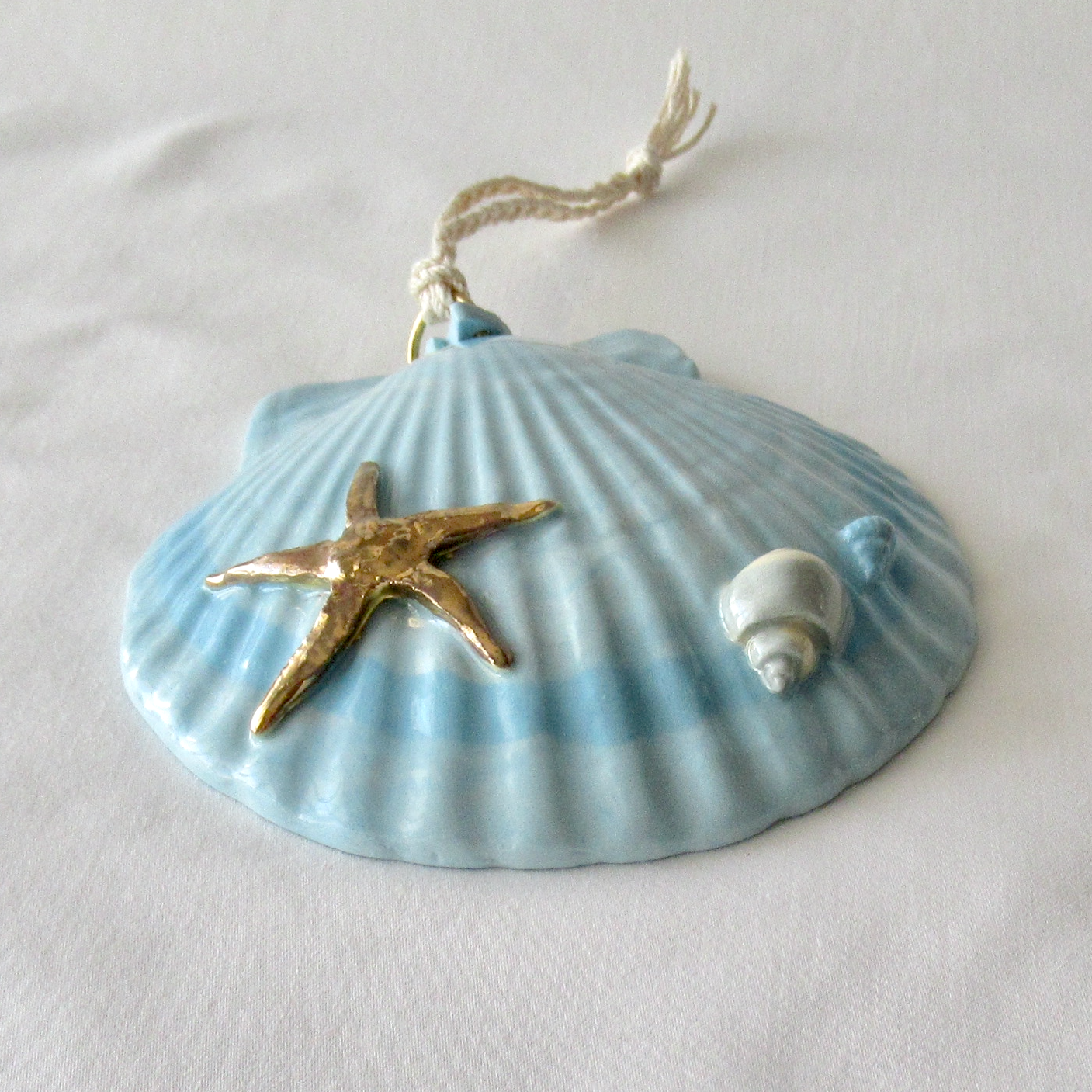 Handmade Seashell Blue Colored Porcelain Hanging Ornament. Ceramic Pottery